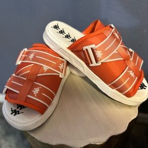 Kappa orange slide sandals size 9 in women 7 in men.